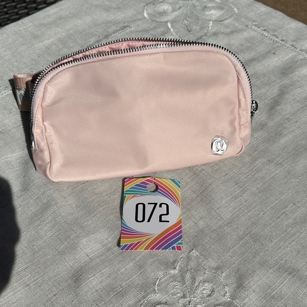 072,NWT Lululemon Everywhere Belt Bag 1l Wordmark.